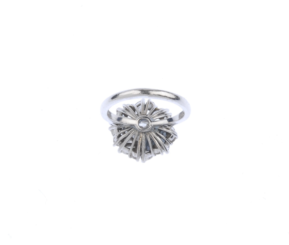 (540651-1-A) A diamond cluster ring. The brilliant-cut diamond, within a marquise and brilliant-