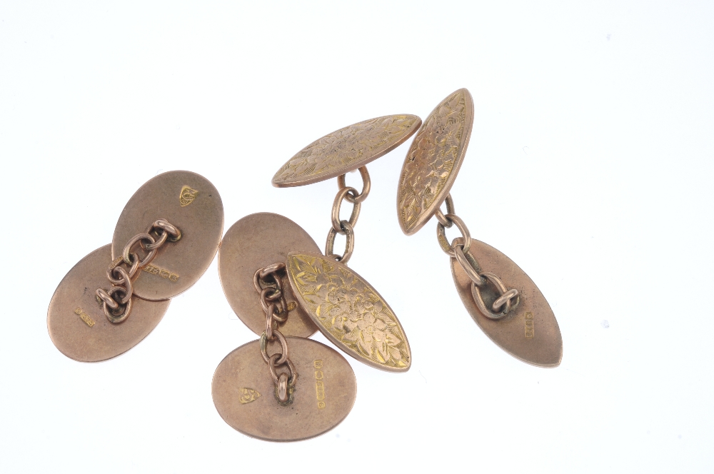 Two pairs of early 20th century 9ct gold cufflinks. To include a pair of oval-shape scroll - Image 2 of 2