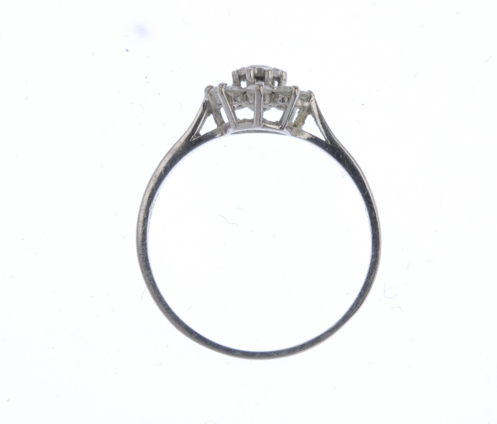 (57565) An 18ct gold diamond cluster ring. Of floral design, the brilliant-cut diamond cluster to - Image 3 of 3