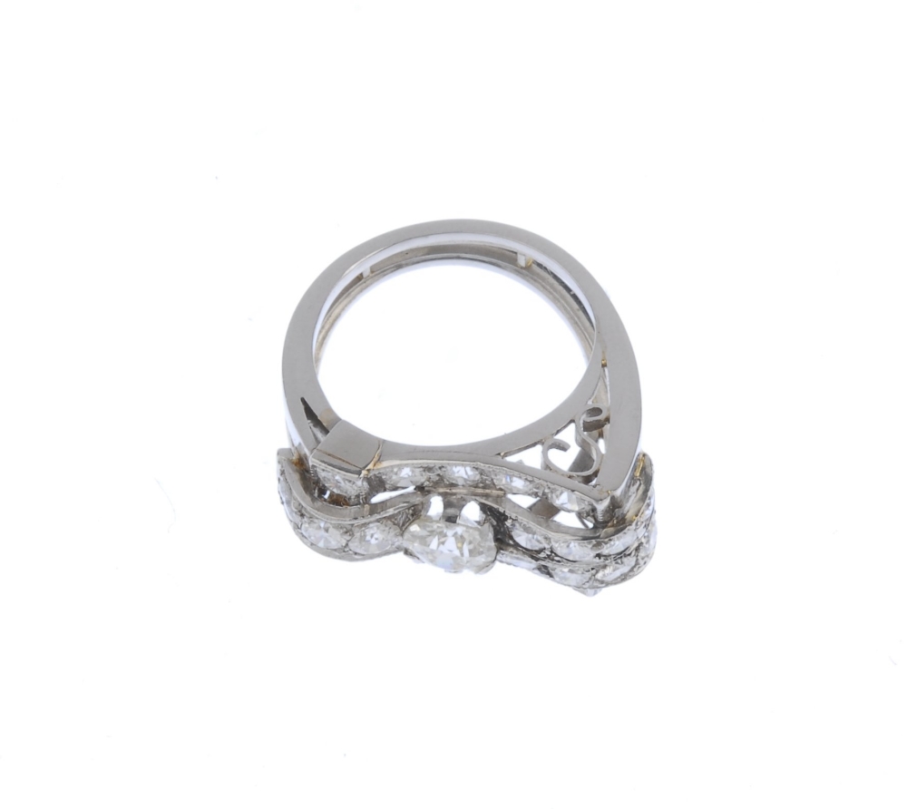 (542447-1-A) A mid-20th century diamond cocktail ring. The old and circular-cut diamond stylised - Image 2 of 4