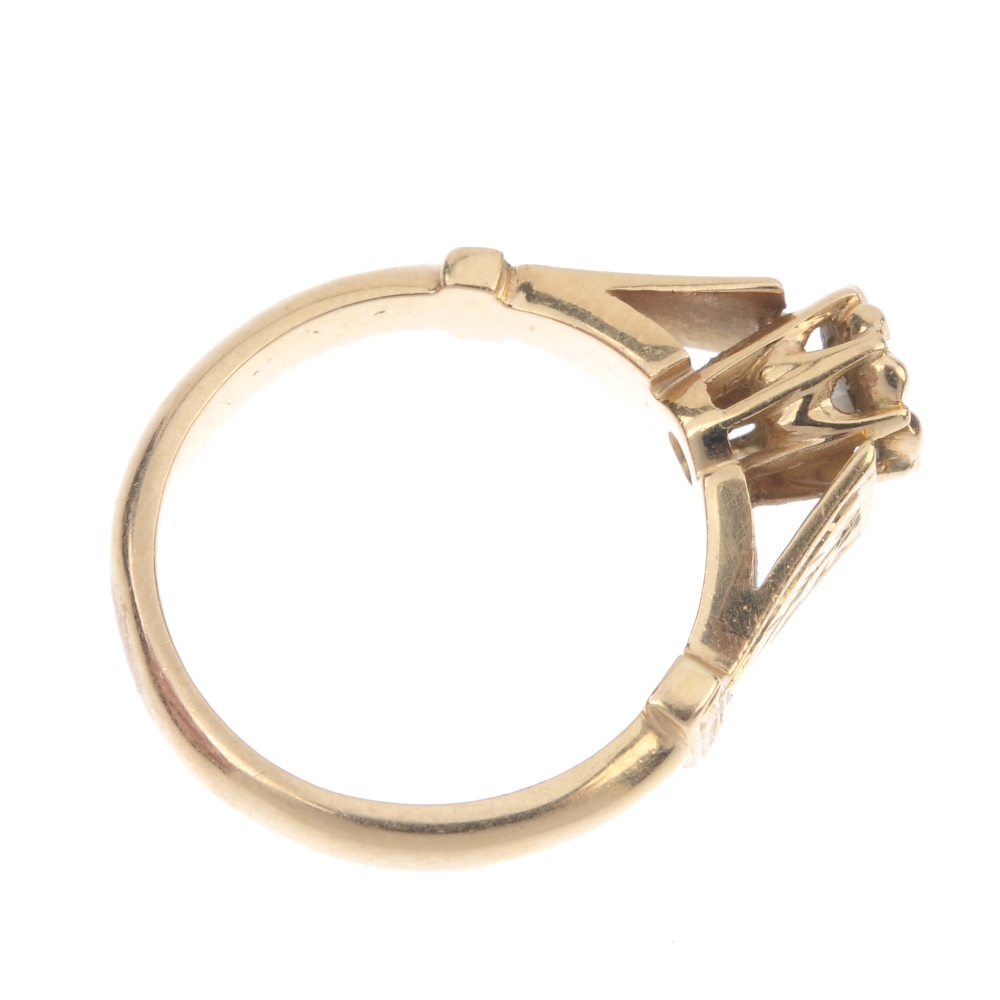 A diamond single-stone ring. The brilliant-cut diamond, within an illusion setting, to the foliate - Image 4 of 4