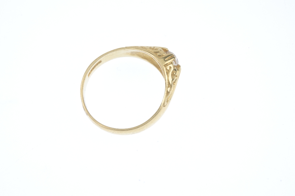 An 18ct gold diamond single-stone ring. The brilliant-cut diamond, to the scrolling sides and - Image 4 of 4