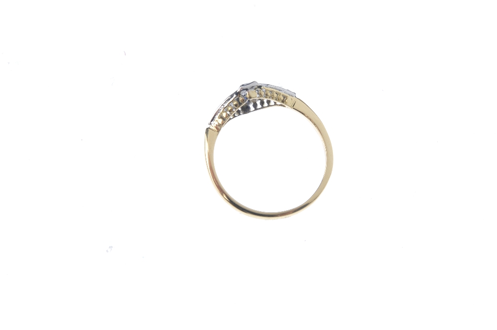 A sapphire and diamond dress ring. The square-shape sapphire line, within a channel setting, to - Image 4 of 4