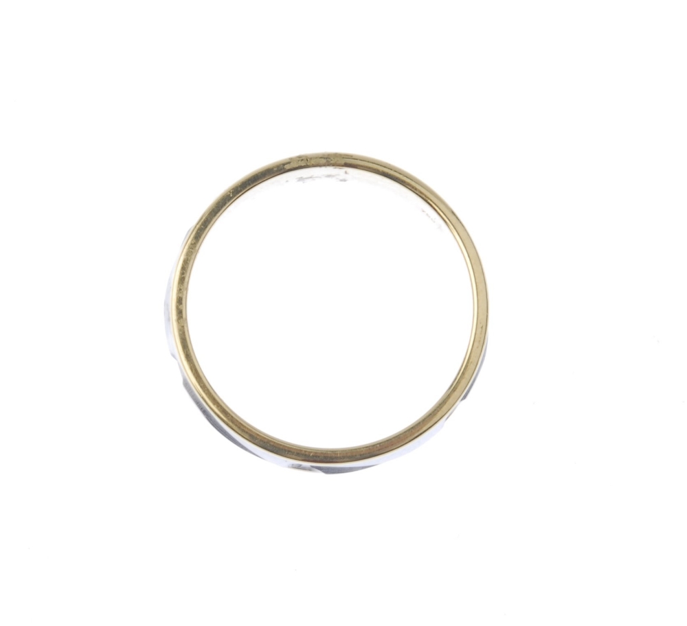 An 18ct gold colour band ring. Of bi-colour design with scrolling motif hallmarks for Birmingham. - Image 2 of 3