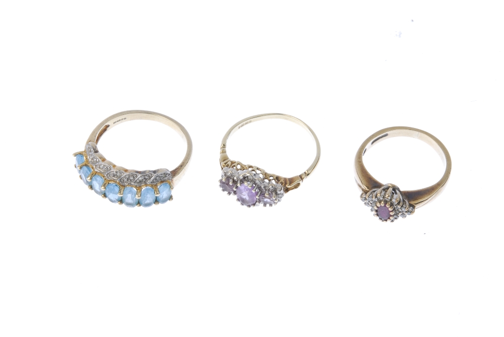 Three 9ct gold gem-set and diamond rings. To include a 9ct gold blue topaz and diamond point dress - Image 2 of 4