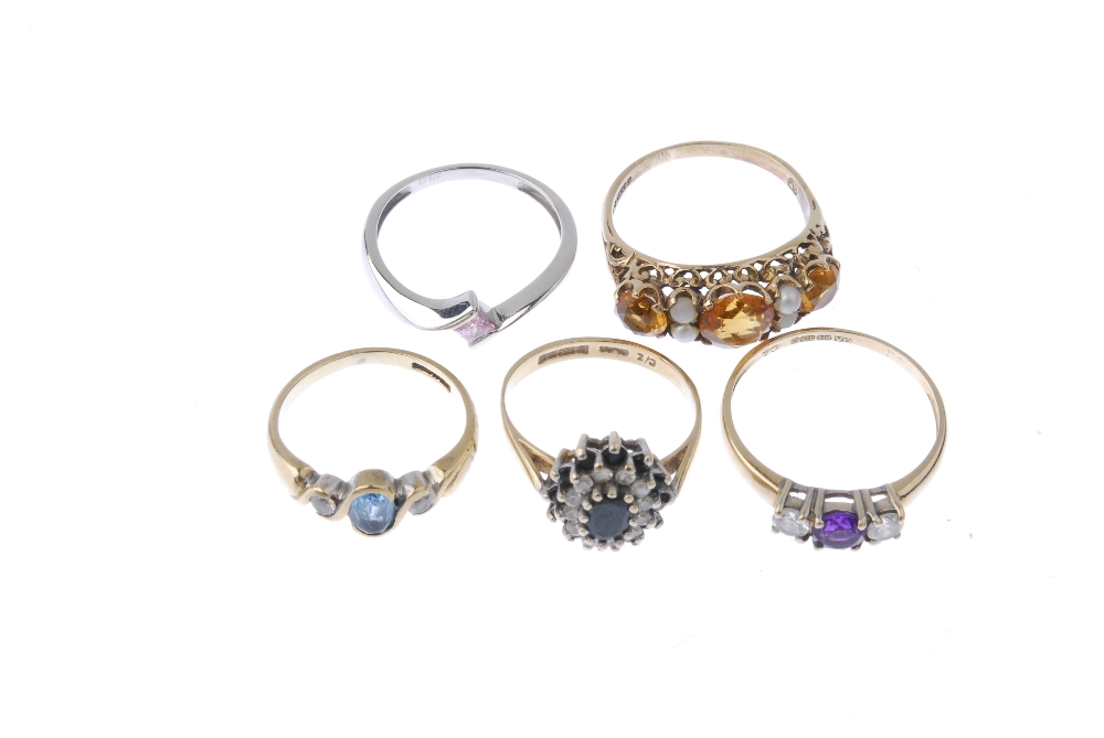 A selection of five 9ct gold gem-set rings. To include a sapphire and cubic zirconia cluster ring, a - Image 2 of 3