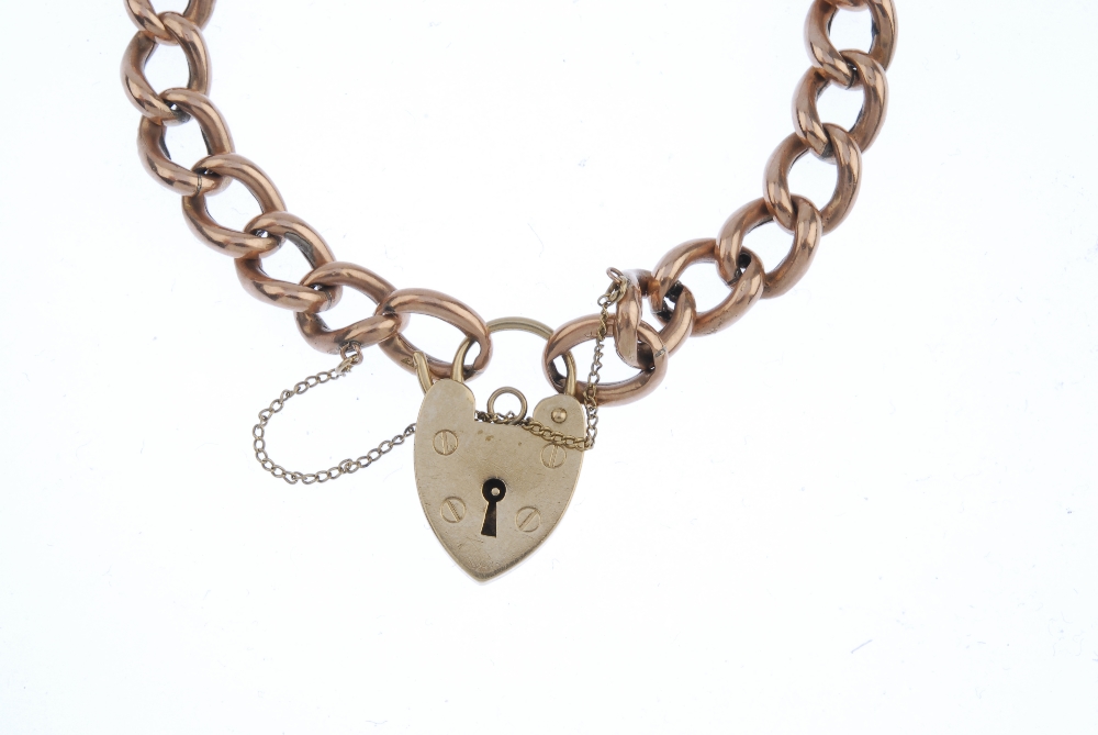 An early 20th century curb-link bracelet. Designed as a series of alternating engraved and plain - Image 2 of 3