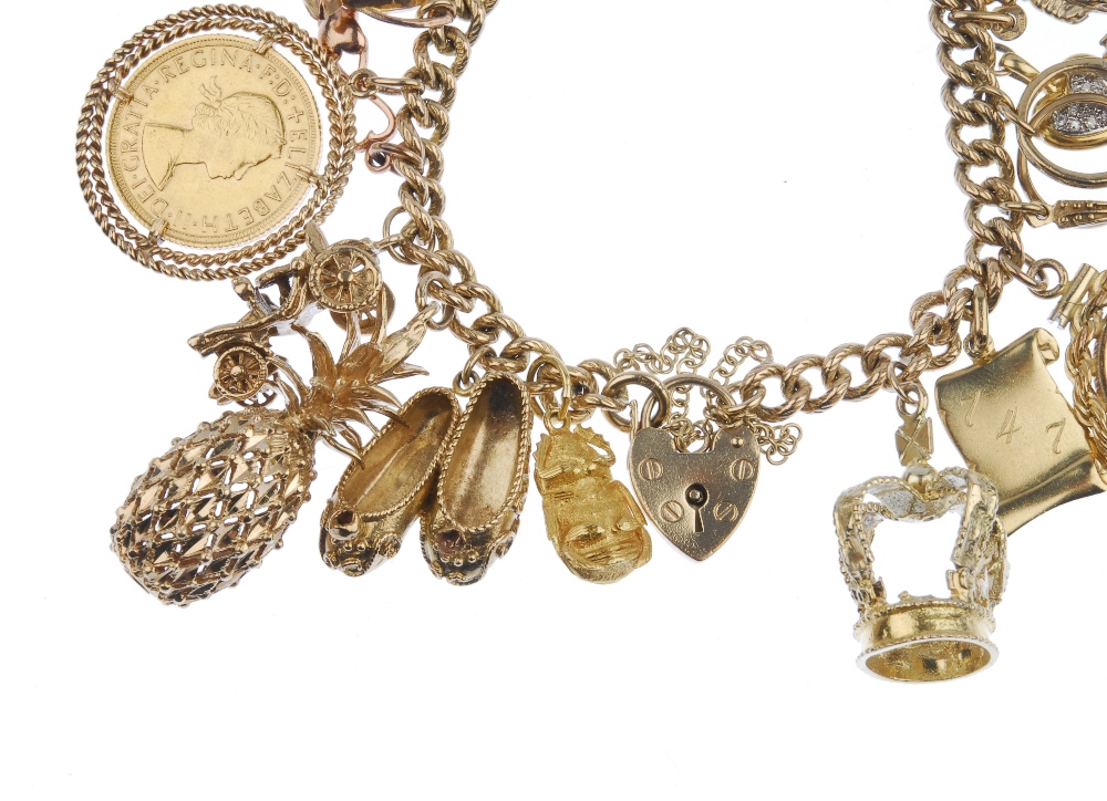 (536178-7-A) A 9ct gold charm bracelet. The textured curb-link chain, suspending a series of - Image 2 of 4