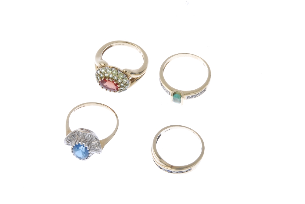 A selection of four gem-set rings. To include a 9ct gold sapphire and diamond band ring, an - Image 2 of 4