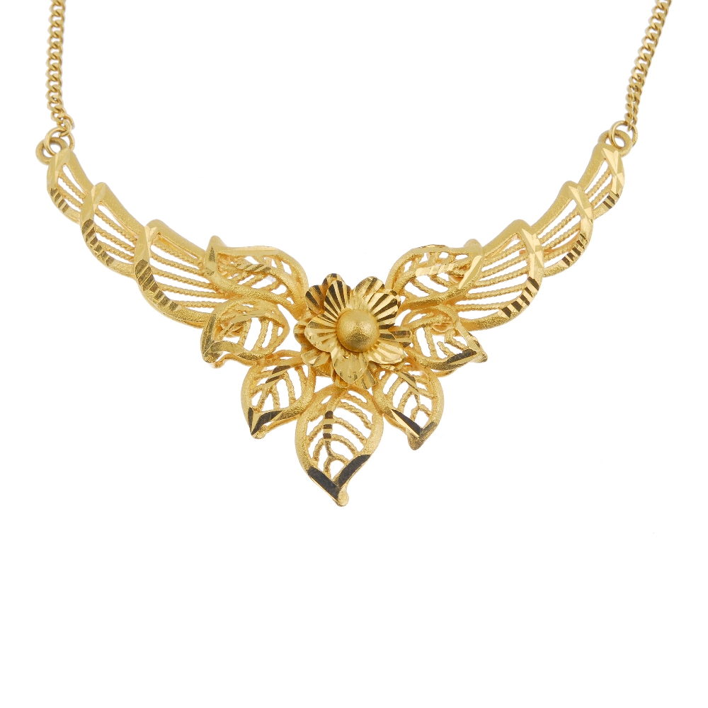 (98098) A selection of Asian jewellery. To include a textured panel and bead necklace, a floral