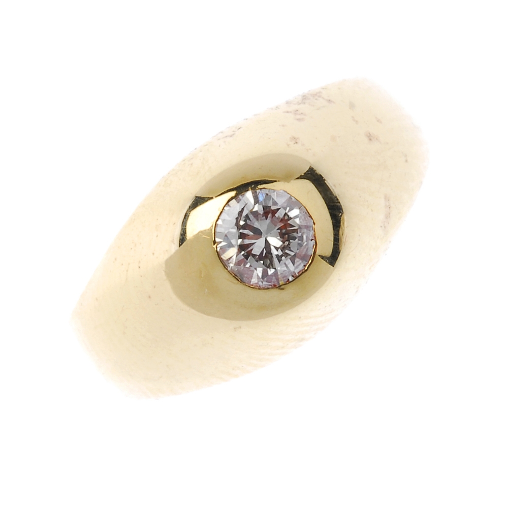 A gentleman's 18ct gold diamond single-stone ring. The brilliant-cut diamond, inset to the tapered