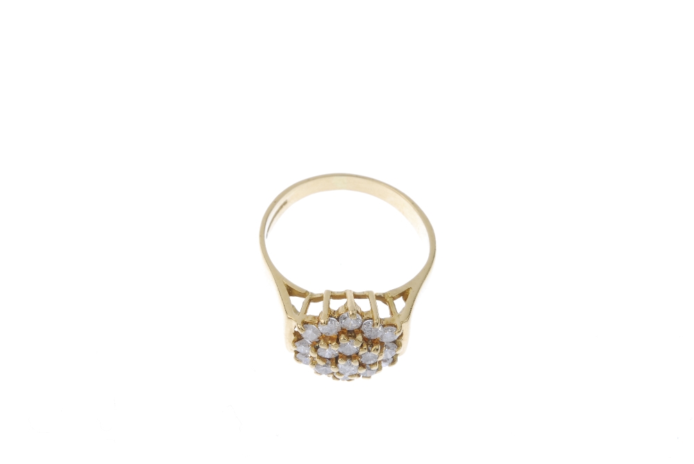 An 18ct gold diamond cluster ring. The brilliant-cut diamond stepped cluster, to the plain band. - Image 2 of 4