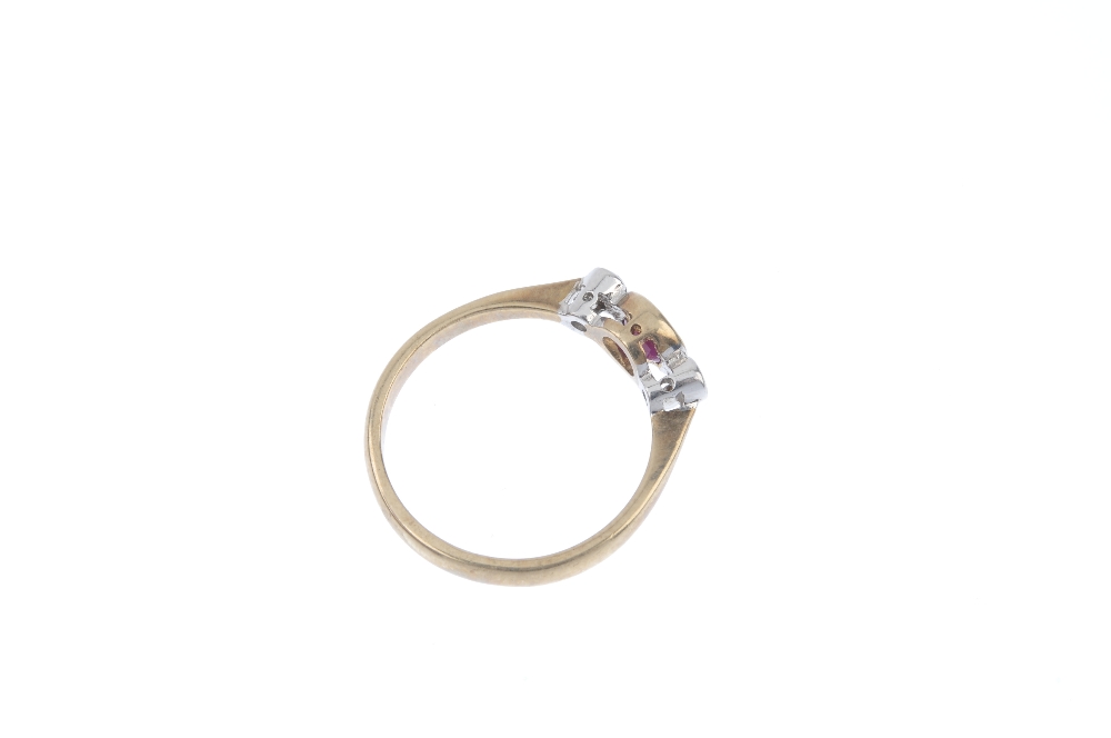 A 9ct gold ruby and diamond ring. The oval-shape ruby, with brilliant-cut diamond sides, to the - Image 4 of 4
