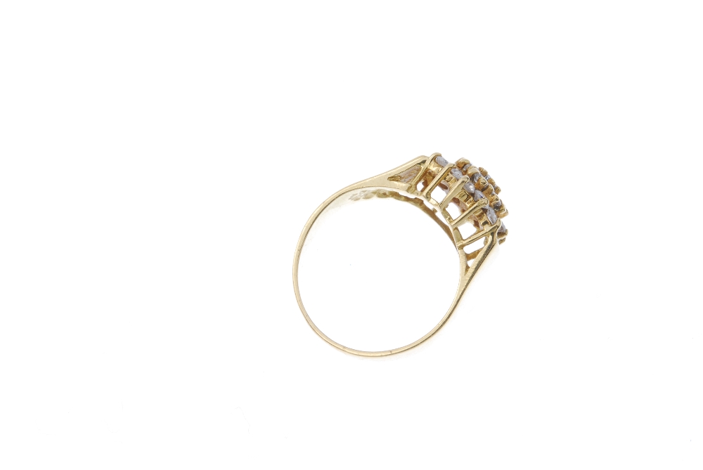 An 18ct gold diamond cluster ring. The brilliant-cut diamond stepped cluster, to the plain band. - Image 4 of 4