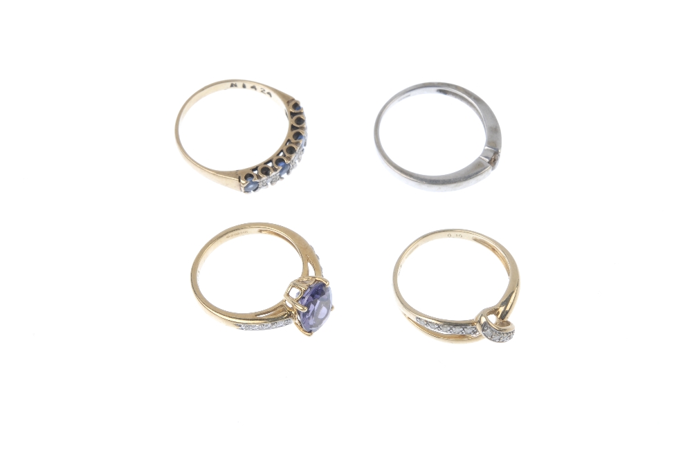 A selection of four 9ct gold diamond and gem-set rings. To include a diamond stylised knot ring, a - Image 3 of 4