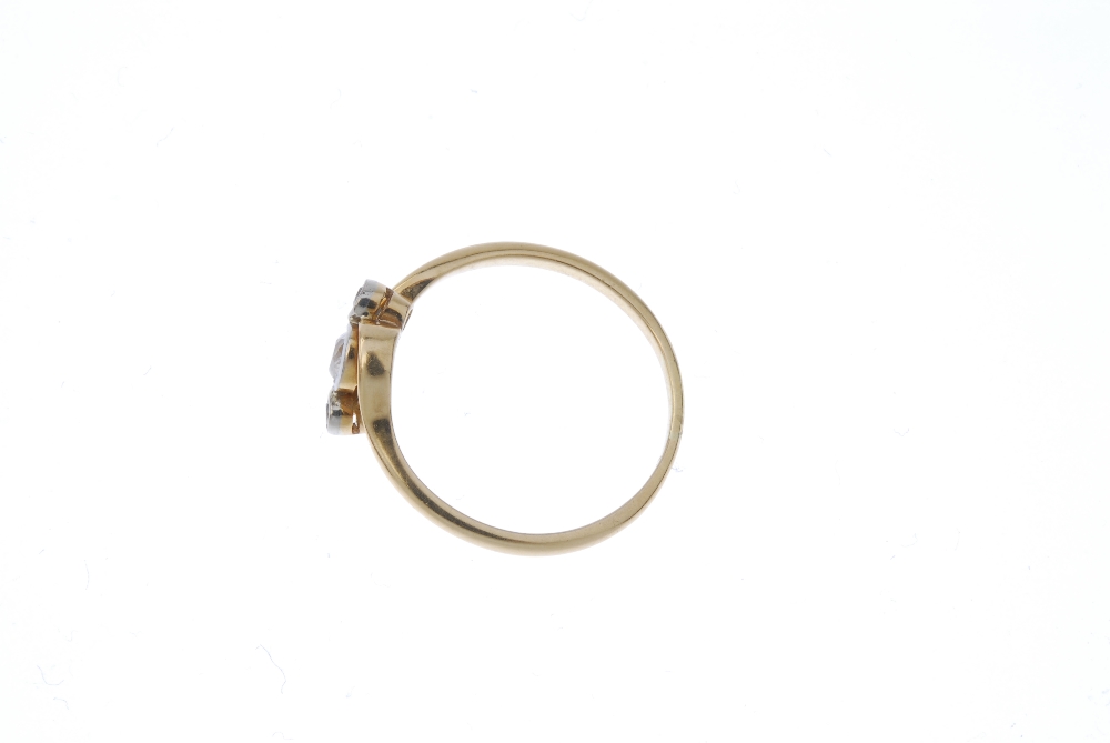 A mid 20th century 18ct gold diamond three-stone ring. The old-cut diamond, with similarly-cut - Image 3 of 4