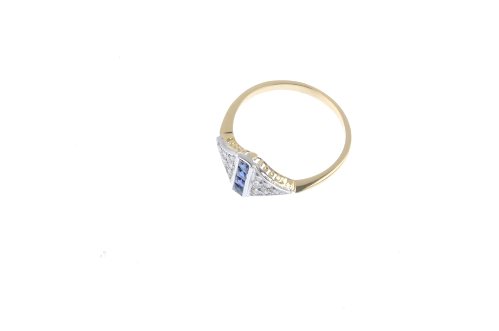 A sapphire and diamond dress ring. The square-shape sapphire line, within a channel setting, to - Image 2 of 4