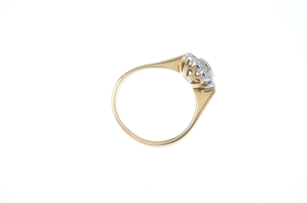 An 18ct gold sapphire and diamond cluster ring. The oval-shape sapphire, within a brilliant-cut - Image 4 of 4