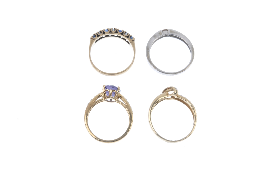 A selection of four 9ct gold diamond and gem-set rings. To include a diamond stylised knot ring, a - Image 4 of 4