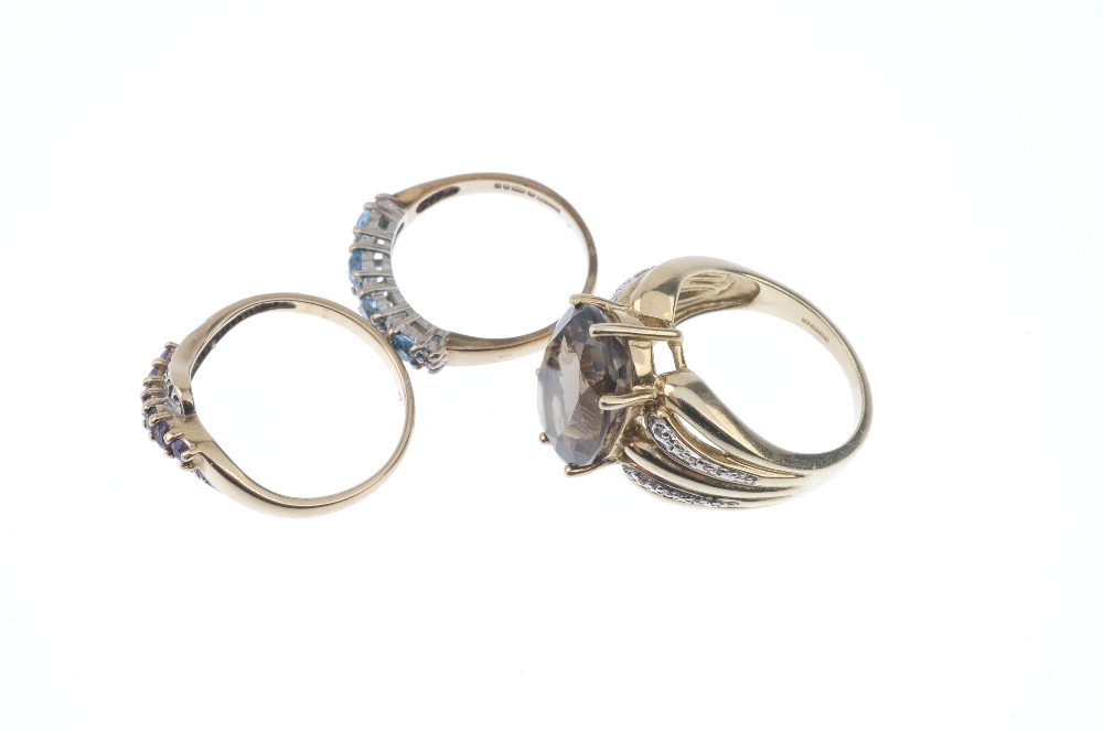 A selection of three 9ct gold diamond and gem-set dress rings. To include a smoky quartz single- - Image 3 of 4