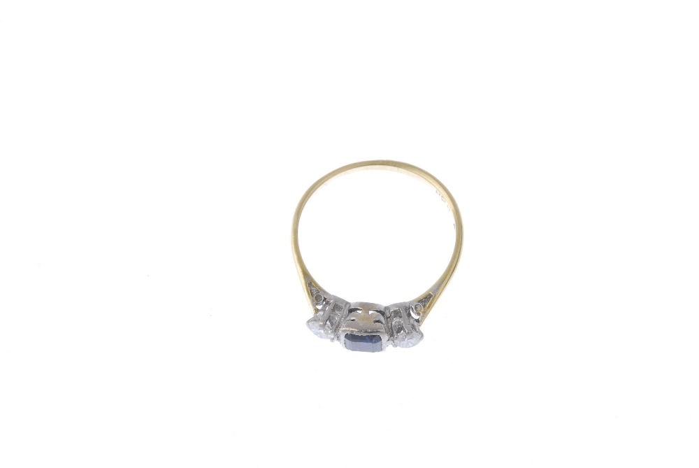 A mid 20th century 18ct gold sapphire and diamond three-stone ring. The square-shape sapphire, to - Image 2 of 4