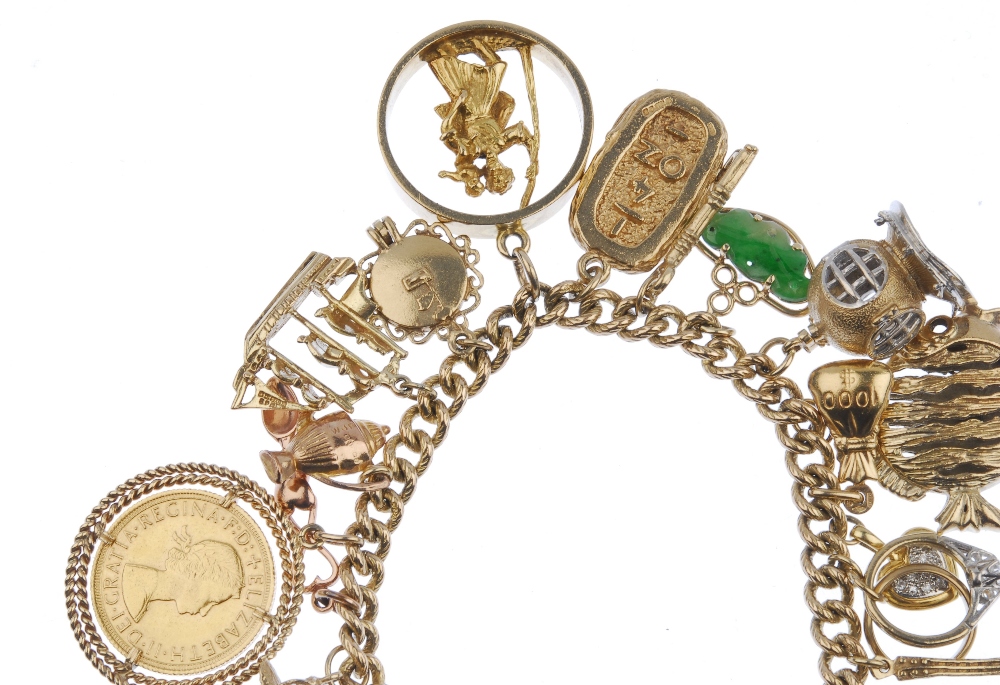 (536178-7-A) A 9ct gold charm bracelet. The textured curb-link chain, suspending a series of - Image 3 of 4