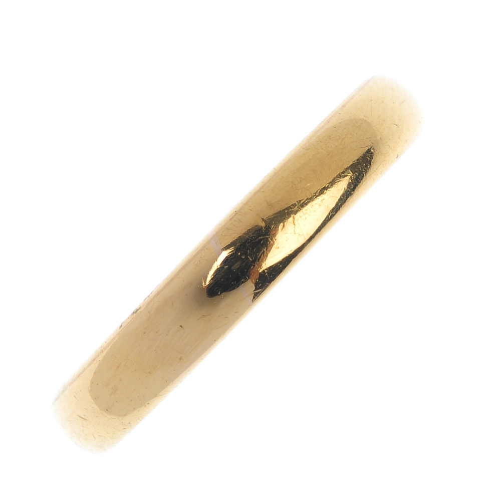 A 1930's 22ct gold band ring. Hallmarks for Birmingham, 1931. Weight 8.4gms. Overall condition