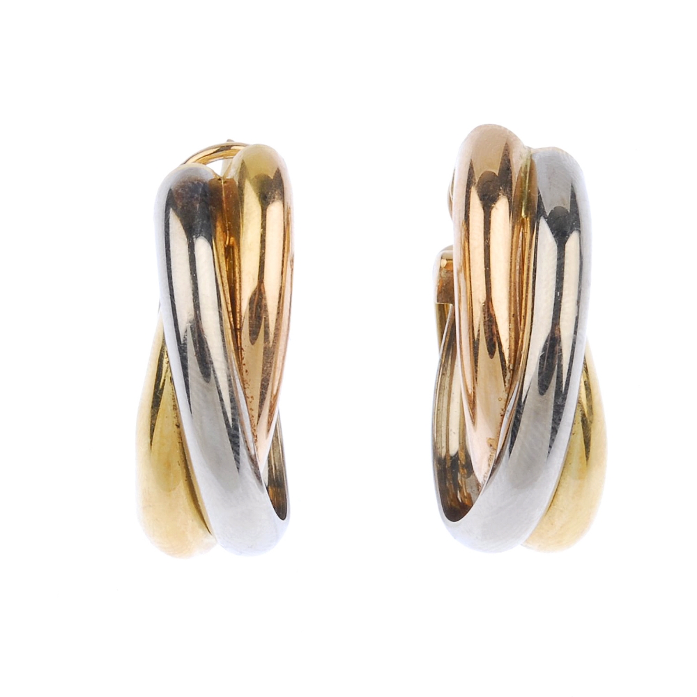 (540752-3-A) CARTIER - a pair of 'trinity' earrings. Each designed as three tri-colour, interwoven