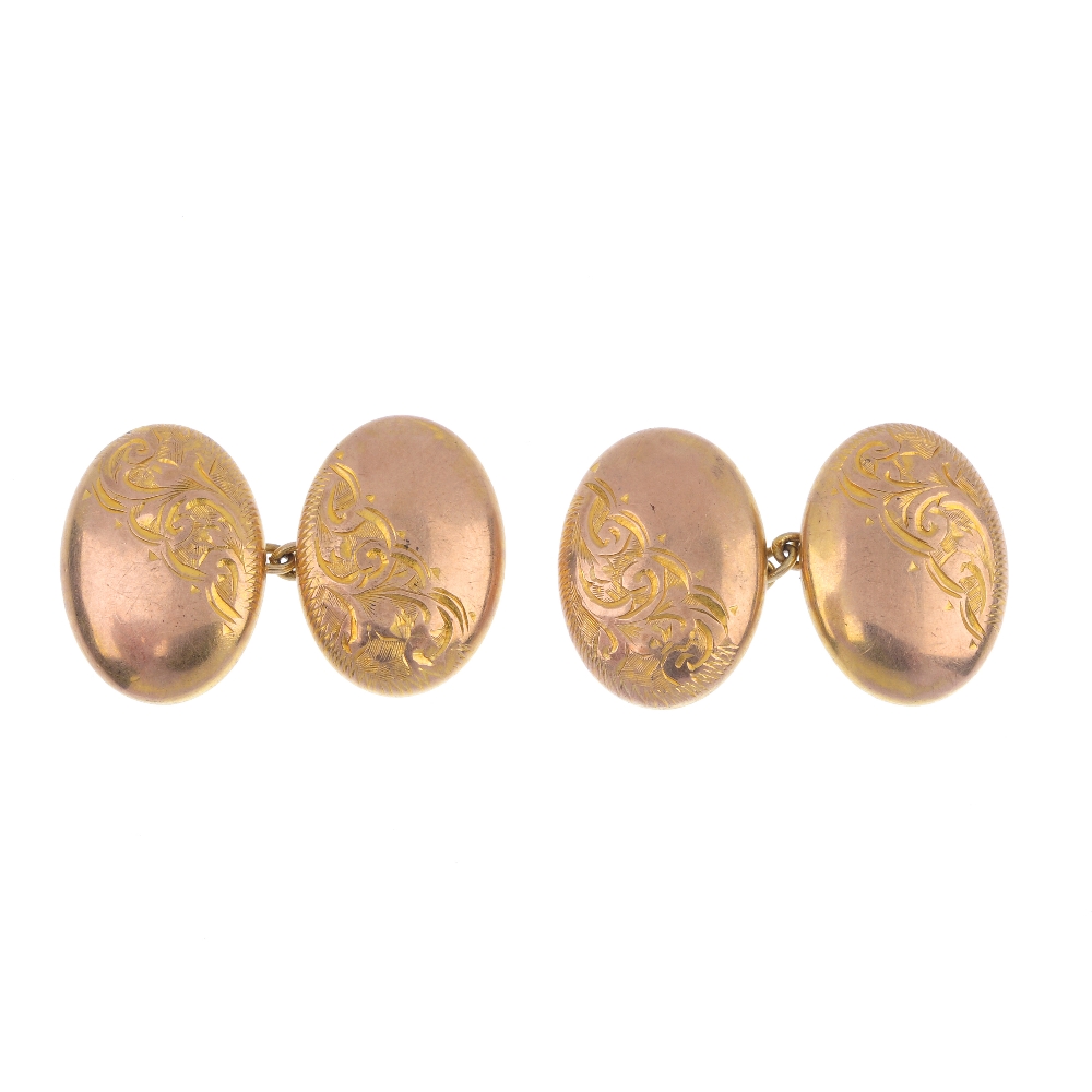 Two pairs of 9ct gold cufflinks. To include a pair of early 20th century 9ct gold oval-shape