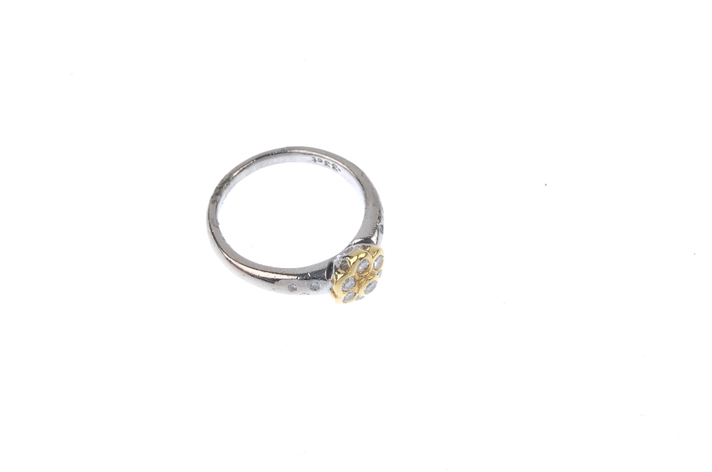 An 18ct gold diamond floral cluster ring. The brilliant-cut diamond collet, within a similarly-cut - Image 3 of 4