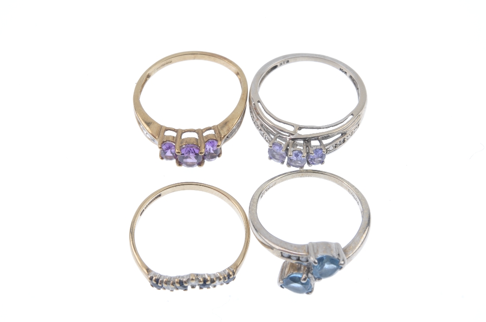 A selection of four diamond and gem-set rings. To include a 9ct gold oval-shape amethyst three-stone - Image 2 of 4