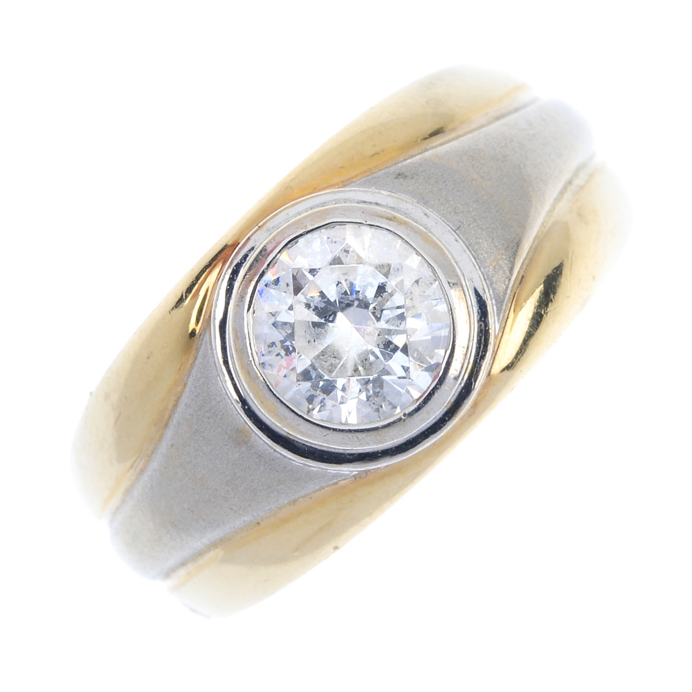 A 14ct gold cubic zirconia single-stone ring. The circular-shape cubic zirconia, to the bi-colour