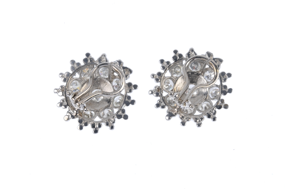 A pair of 14ct gold diamond cluster earrings. Each designed as a brilliant-cut diamond collet, - Image 2 of 2