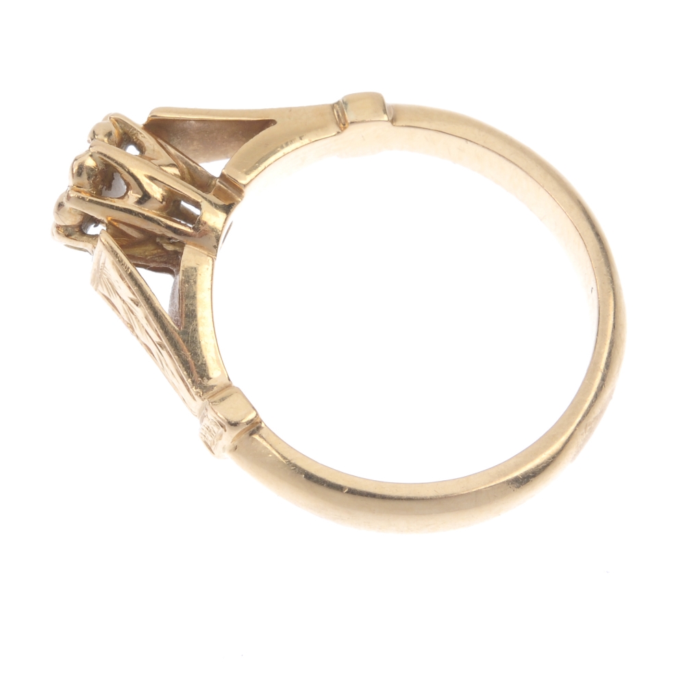 A diamond single-stone ring. The brilliant-cut diamond, within an illusion setting, to the foliate - Image 3 of 4