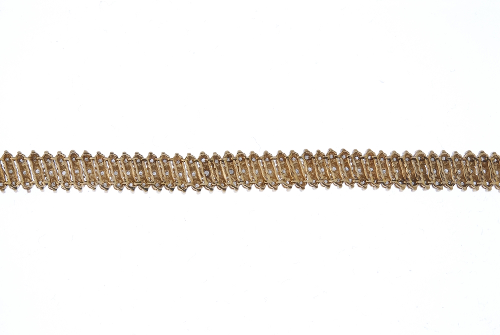 A 9ct gold diamond bracelet. Designed as a series of single-cut diamond diagonal bar links, to the - Image 2 of 3