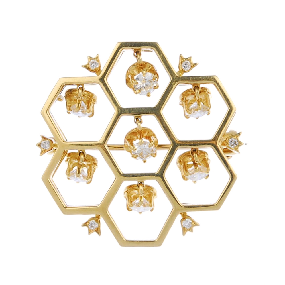 (536178-4-A) An 18ct gold diamond brooch. Of openwork design, comprising a series of brilliant-cut