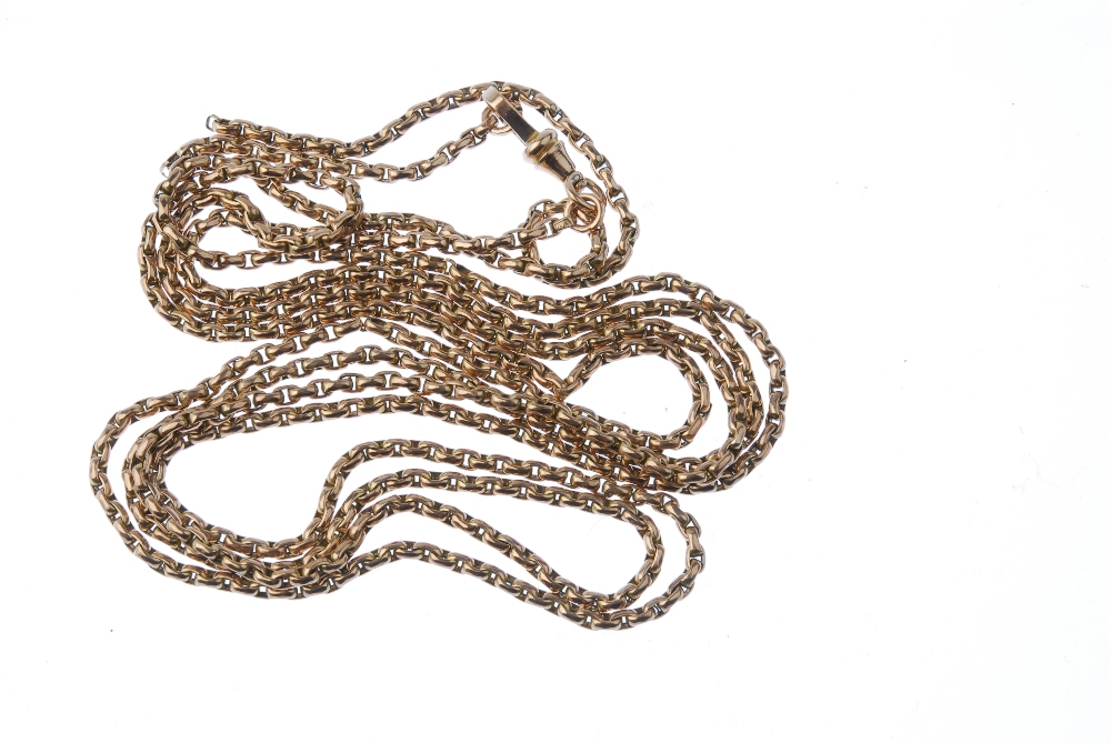 An early 20th century 9ct gold longuard chain. The faceted belcher-link chain, with lobster claw - Image 2 of 2