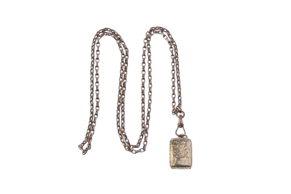 A late Victorian locket, with chain. The rectangular-shape locket with foliate front and back, - Image 2 of 2