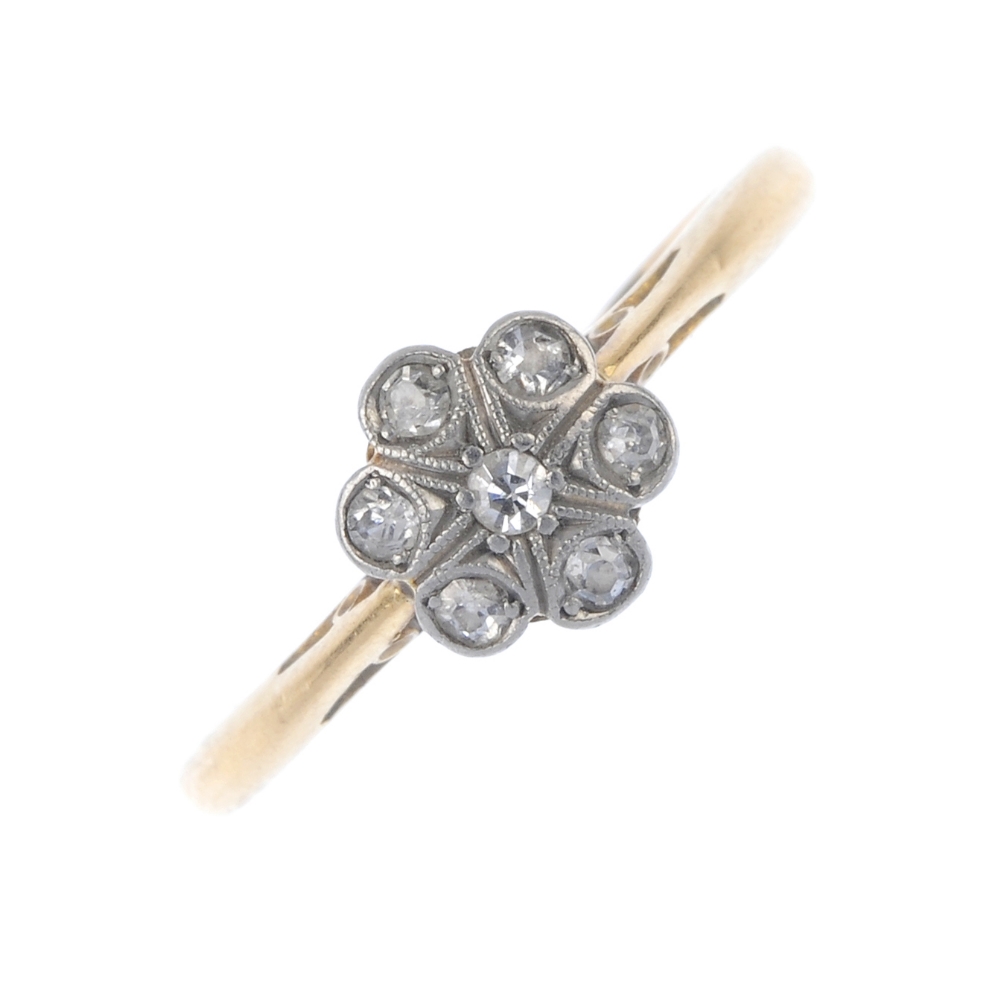 A mid 20th century 18ct gold diamond cluster ring. The single-cut diamond cluster, to the tapered