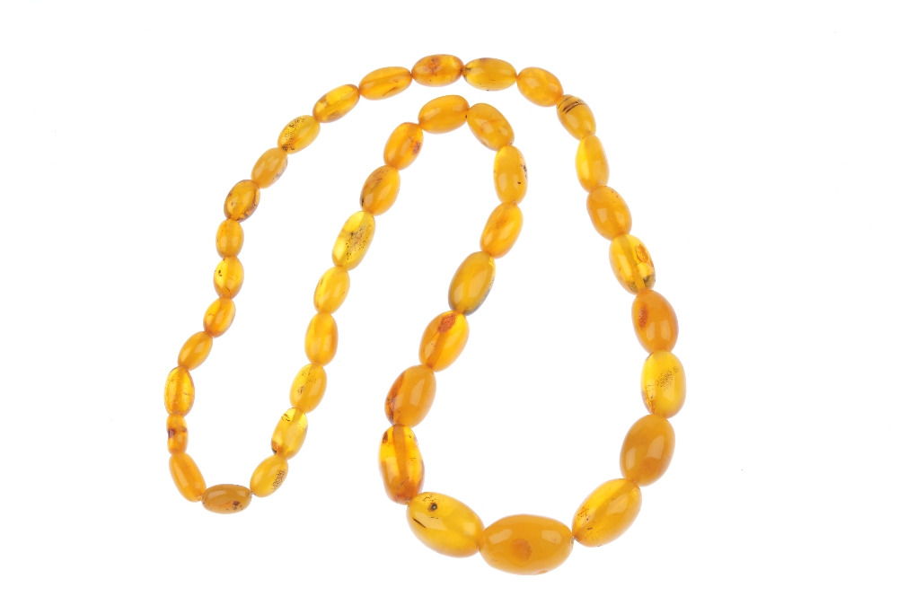 A natural amber necklace. Comprising forty-two graduated beads measuring 1.4 to 2.8cms. Length - Image 2 of 2