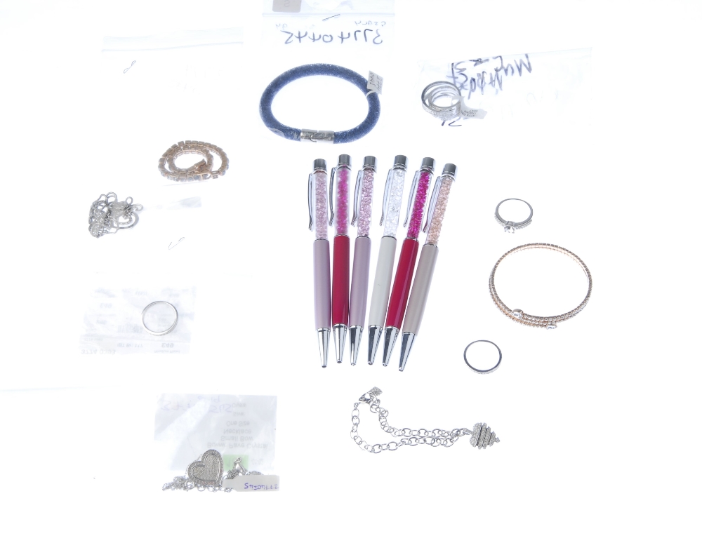 SWAROVSKI - seventeen items of jewellery and pens. To include six pens, various pendants, rings - Image 2 of 2