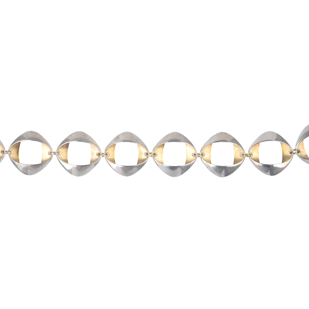 GEORG JENSEN - a silver necklace. Comprising a series of thirteen bi-colour oval-shape links, to the - Image 3 of 3