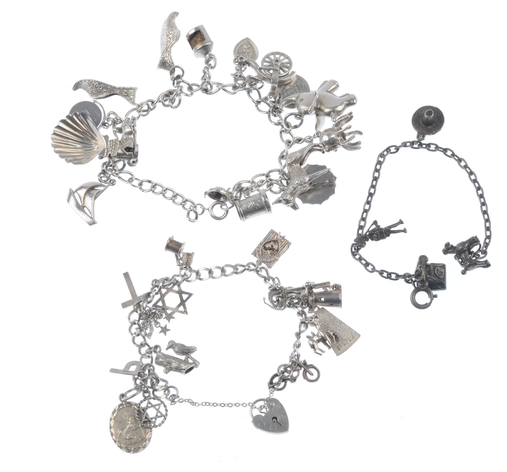 Four charm bracelets. Suspending a total of forty charms, to include a skier within a stein, an - Image 2 of 2