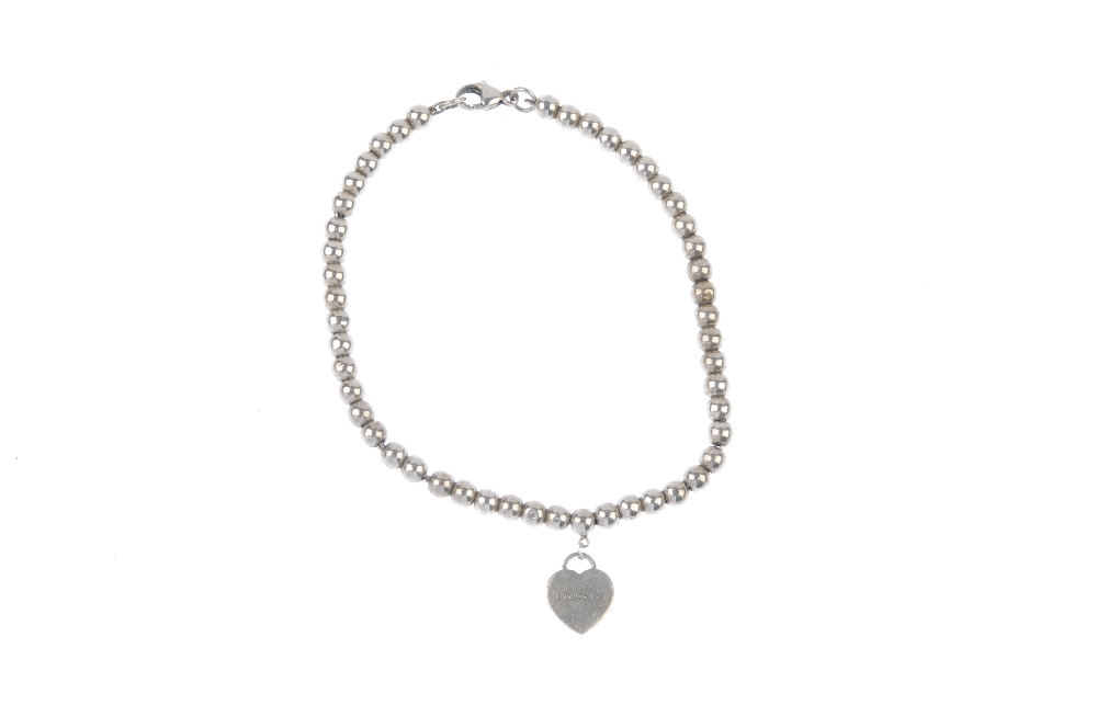TIFFANY & CO. - a 'Return to Tiffany' bracelet. The miniature heart-shaped charm with 'Return to - Image 3 of 3