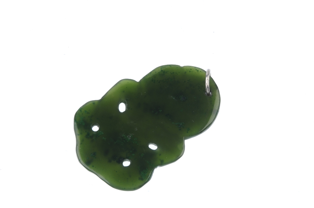 A Maori jade hei-tiki. The Maori jade carved as a typical hei-tiki to the plain surmount loop. - Image 2 of 2