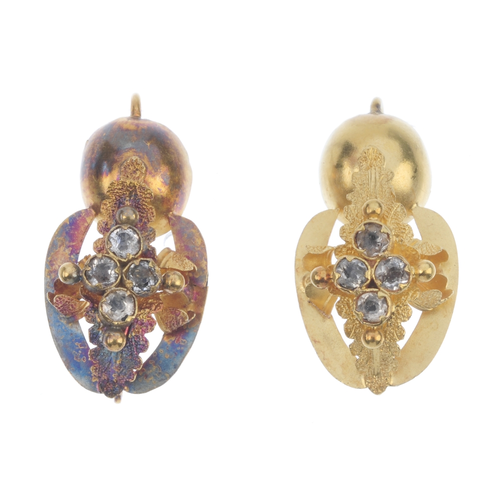 A pair of late Victorian paste earrings. Each designed as a colourless gem quatrefoil, atop a