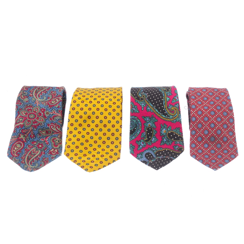 A selection of silk ties and handkerchiefs. To include a red and blue patterned Hermes tie, a