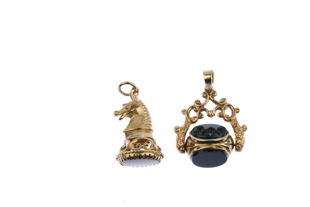 Two 9ct gold gem-set fobs. The first designed as a circular carnelian to the horse head shaped grip, - Image 2 of 2