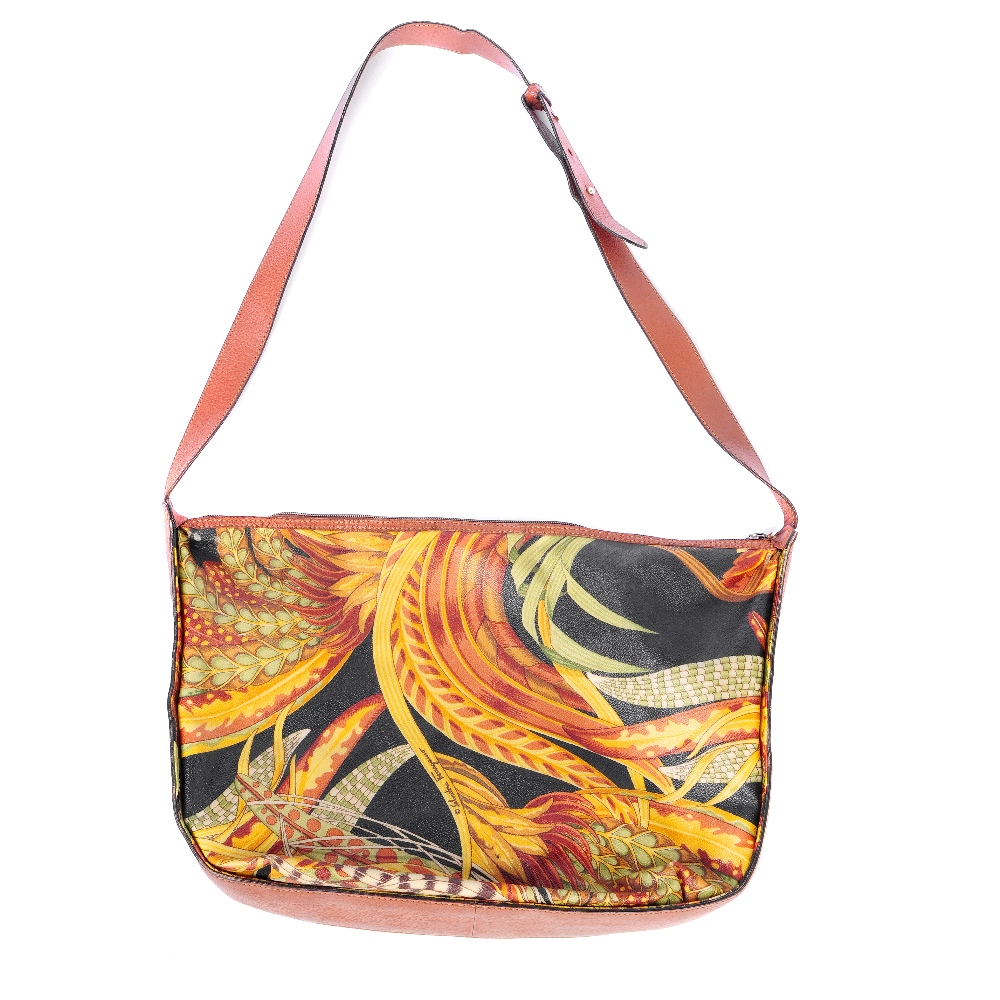 SALVATORE FERRAGAMO - a handbag with interior purse. Designed with a printed jungle motif