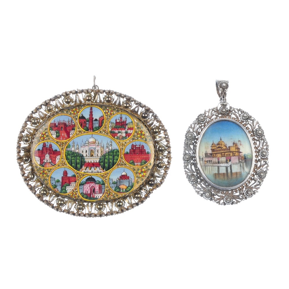 Two items of Indian jewellery. Both of oval outline with filigree surrounds, the first a pendant